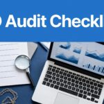 Laptop with analytics charts, a checked checklist, and magnifying glass beneath a blue SEO headline.